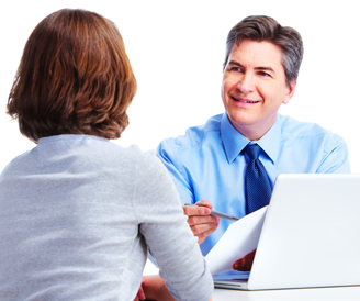 HR manager reviewing an employment background check with a colleague